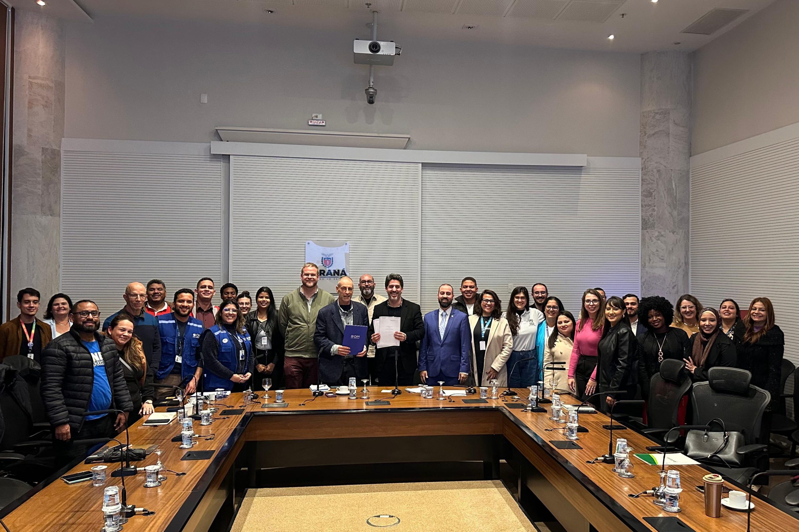 Secretaria da Justiça e Cidadania assina memorando de cooperação com braço da ONU para migrações Crédito: SEJU-PR